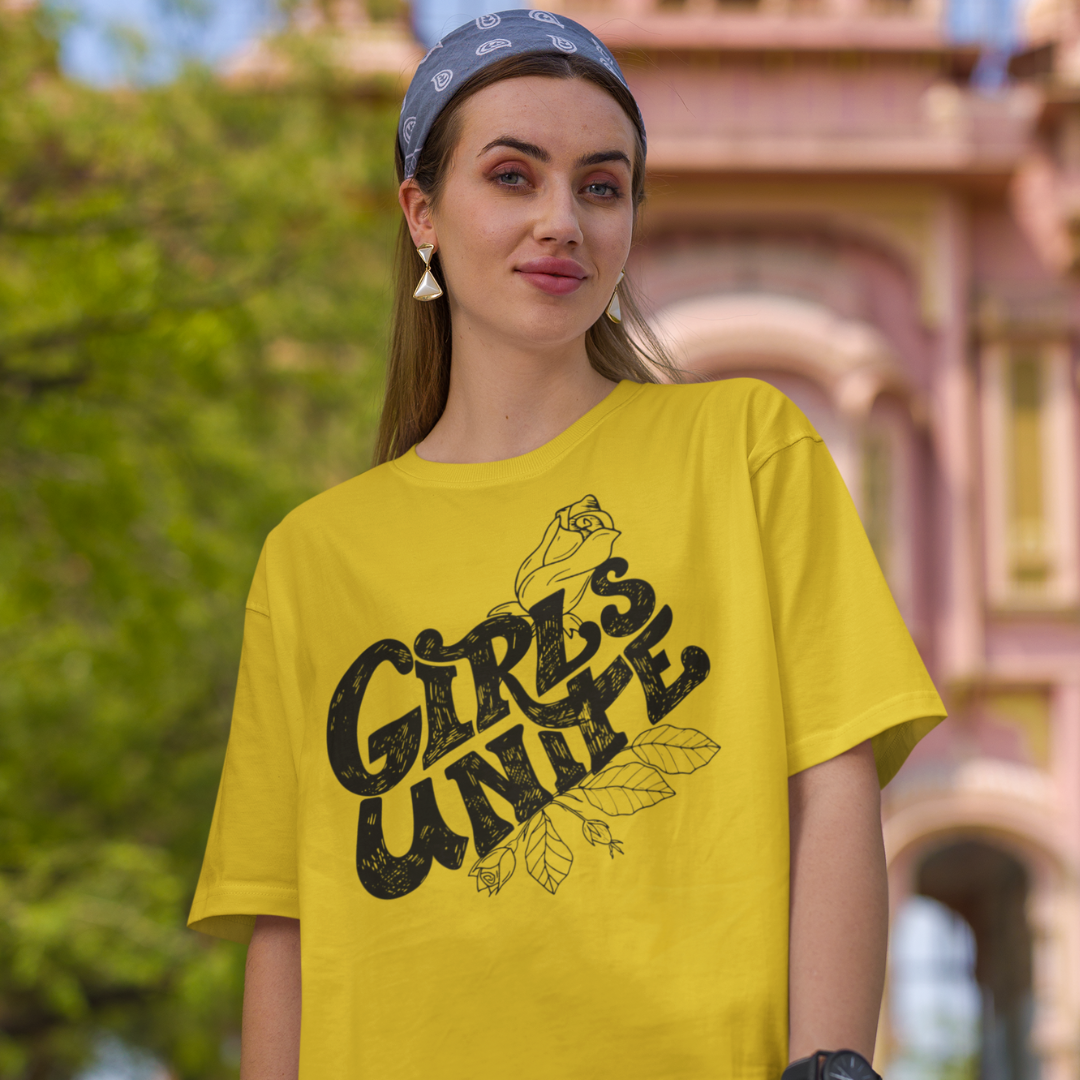 Female empowerment t-shirt with bold hand drawn letters saying Girls Unite from HeadhunterGear. 